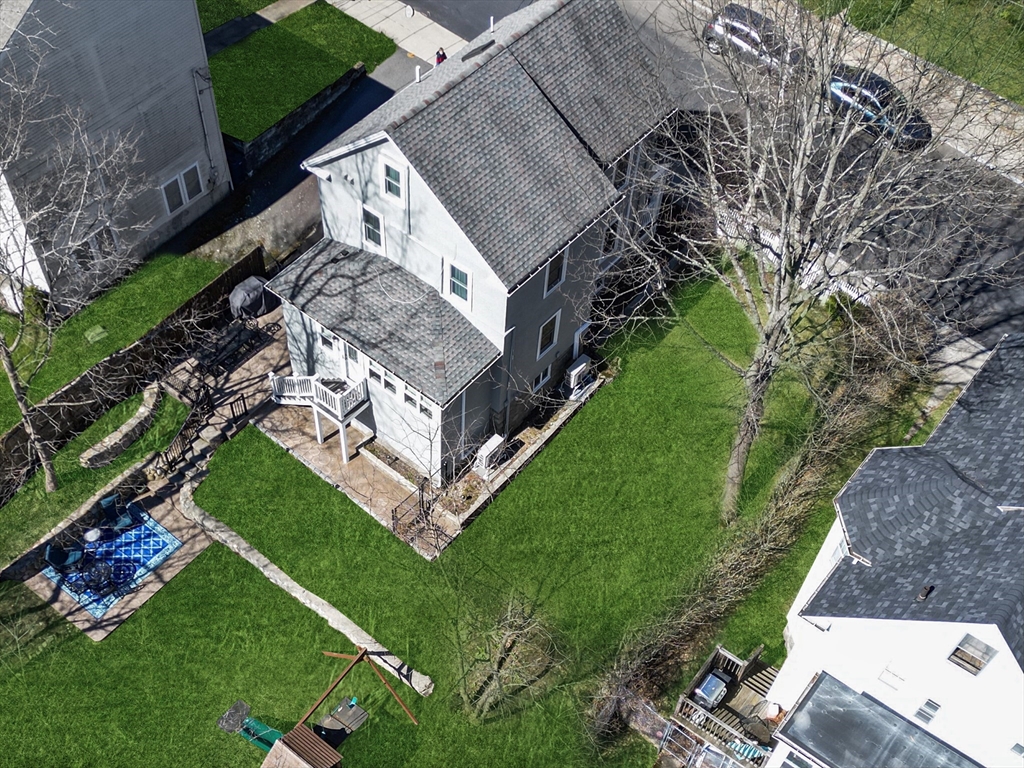 42 Partridge Street Boston, MA 02132 - Photo 27 of 33 a view of a house with a big yard