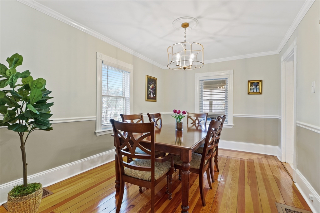 42 Partridge Street Boston, MA 02132 - Photo 5 of 33 a view of a dining room with furniture window and wooden floor