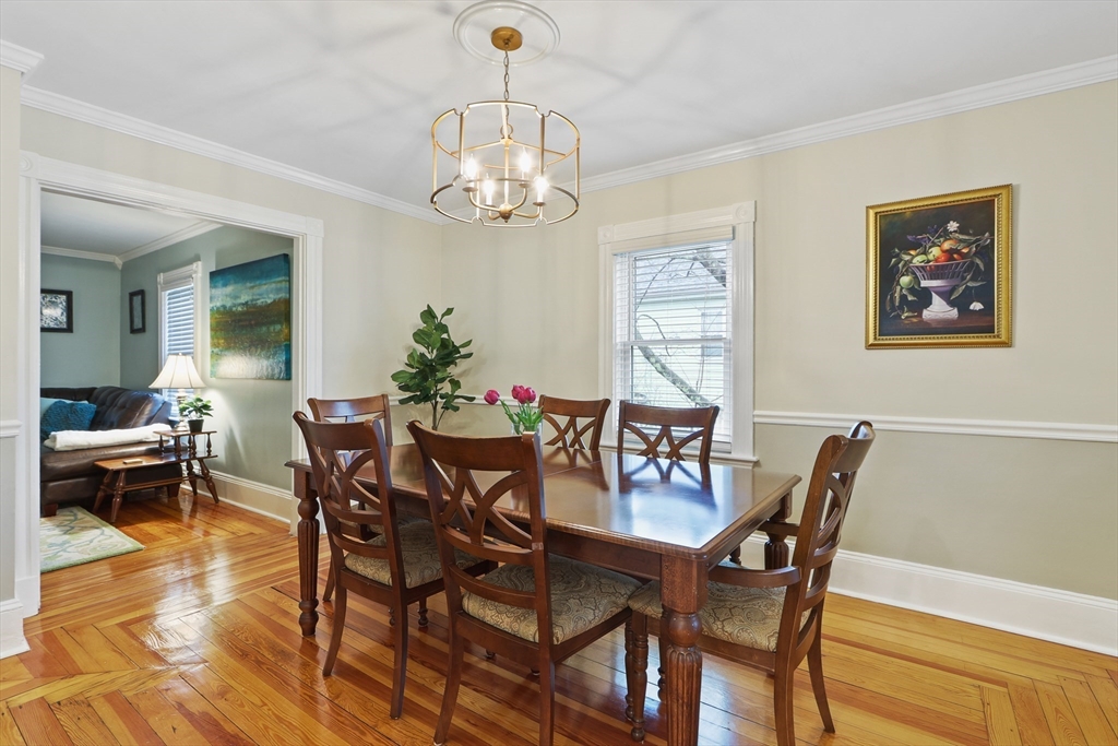 42 Partridge Street Boston, MA 02132 - Photo 6 of 33 a view of a dining room with furniture window and wooden floor