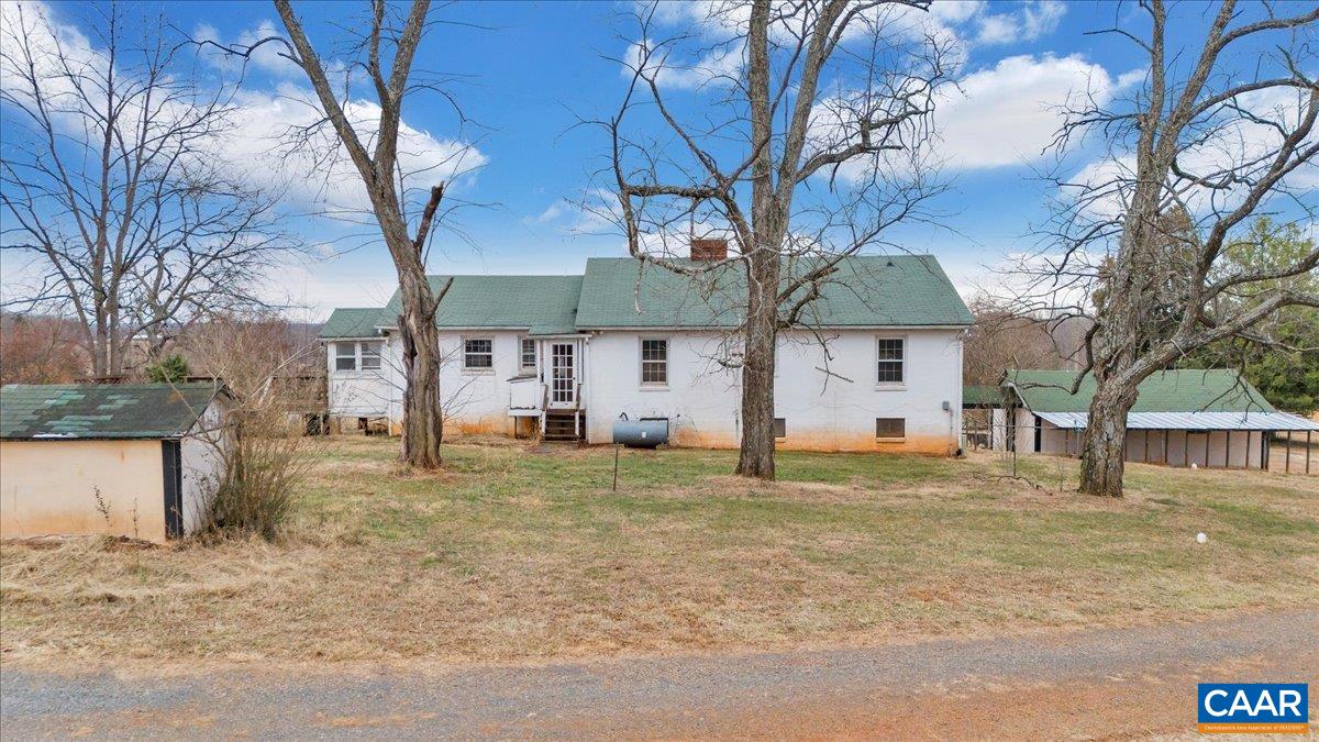 2420 James River Road Esmont, VA 22937 - Photo 39 of 75 a house that has a tree in front of it