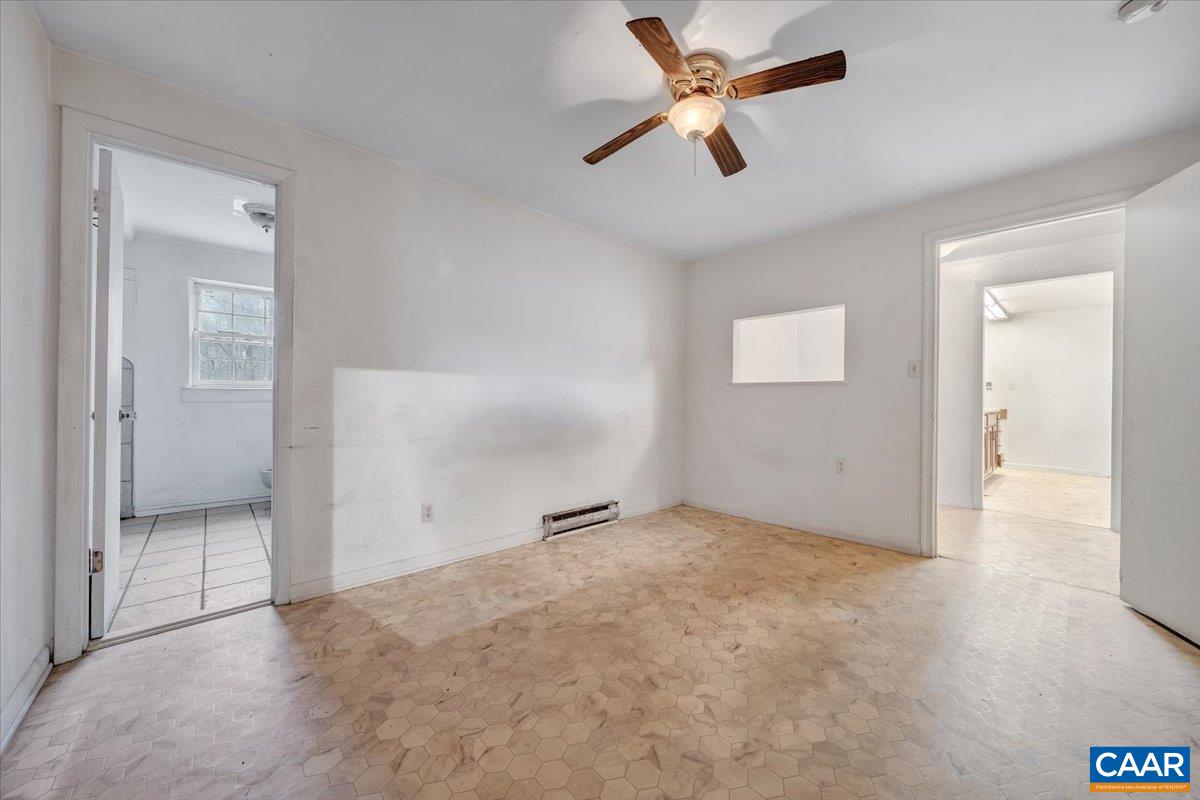 2420 James River Road Esmont, VA 22937 - Photo 52 of 75 an empty room with closet and windows