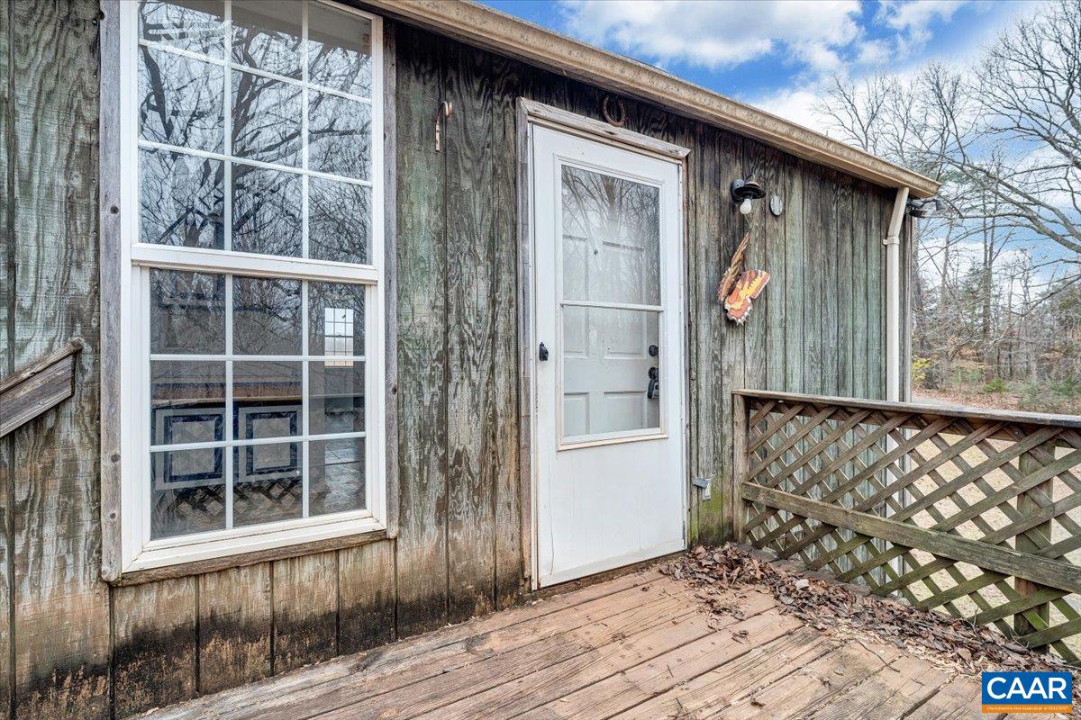 2420 James River Road Esmont, VA 22937 - Photo 55 of 75 a front view of a house with a yard