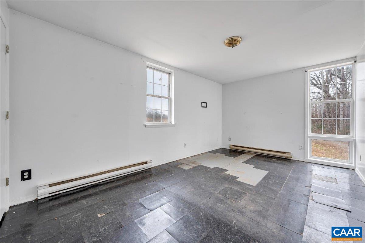 2420 James River Road Esmont, VA 22937 - Photo 62 of 75 an empty room with windows