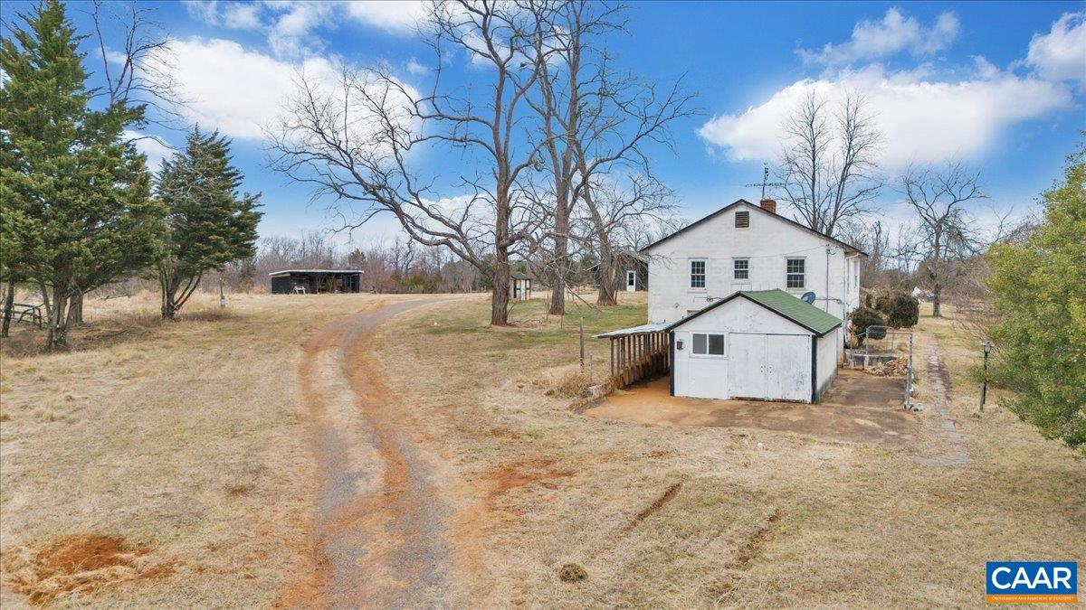 2420 James River Road Esmont, VA 22937 - Photo 64 of 75 a front view of a house with a yard