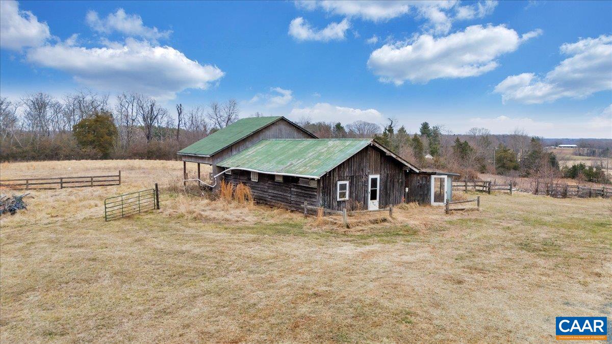 2420 James River Road Esmont, VA 22937 - Photo 67 of 75 a view of a house with a yard