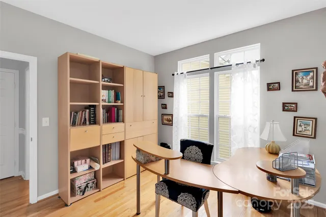 a bathroom with a sink mirror and toilet
