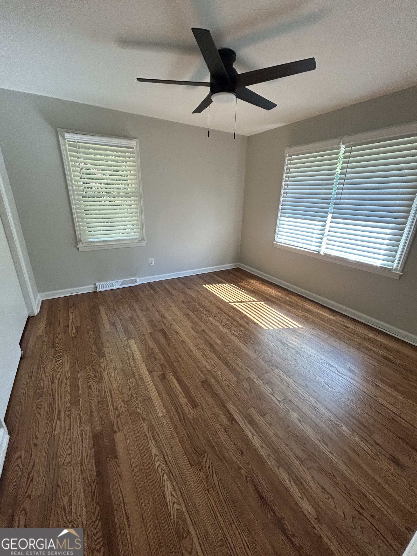 2 Ford Road Southeast Rome, GA 30161 - Photo 15 of 19 wooden floor in an empty room with a window