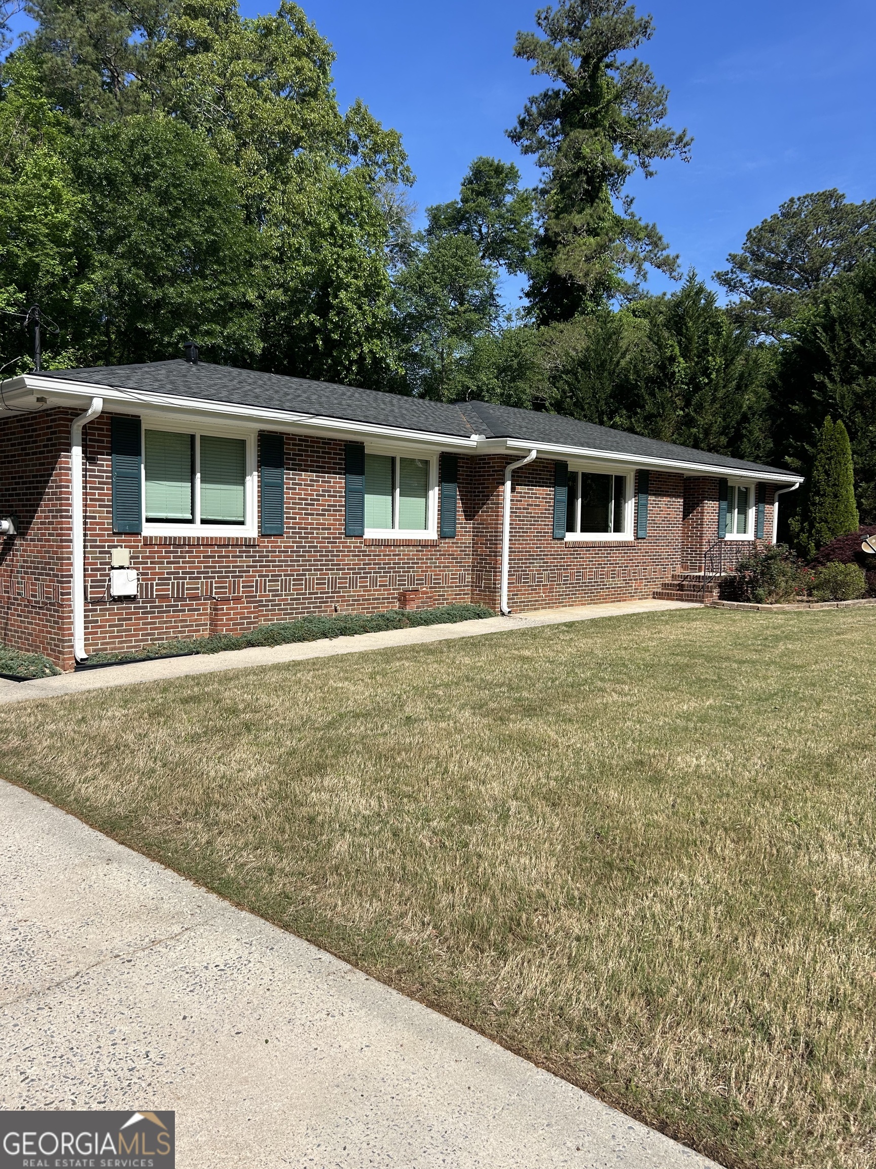 2 Ford Road Southeast Rome, GA 30161 - Photo 2 of 19 front view of house with a yard