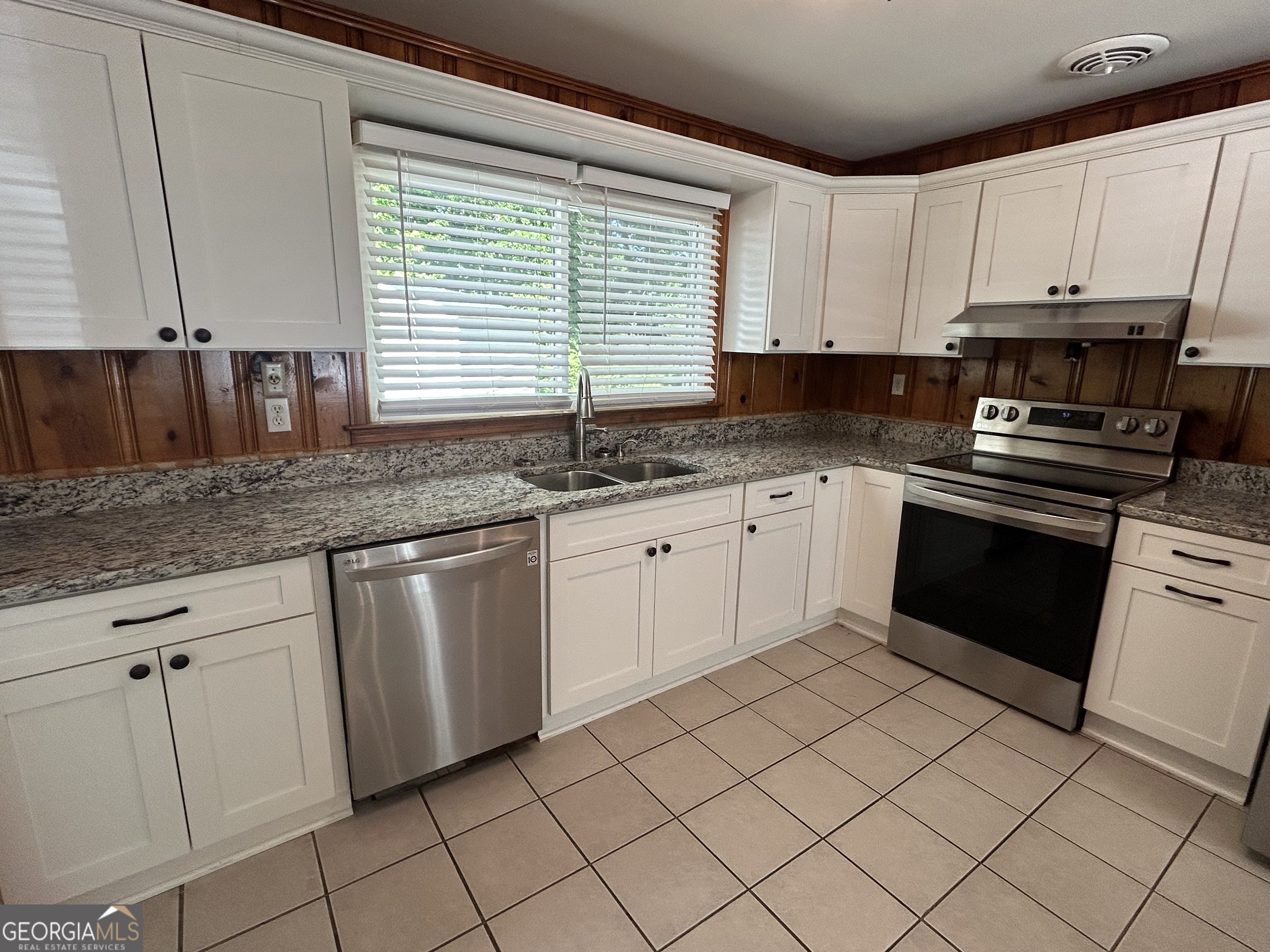 2 Ford Road Southeast Rome, GA 30161 - Photo 5 of 19 a kitchen with stainless steel appliances granite countertop a sink and a stove