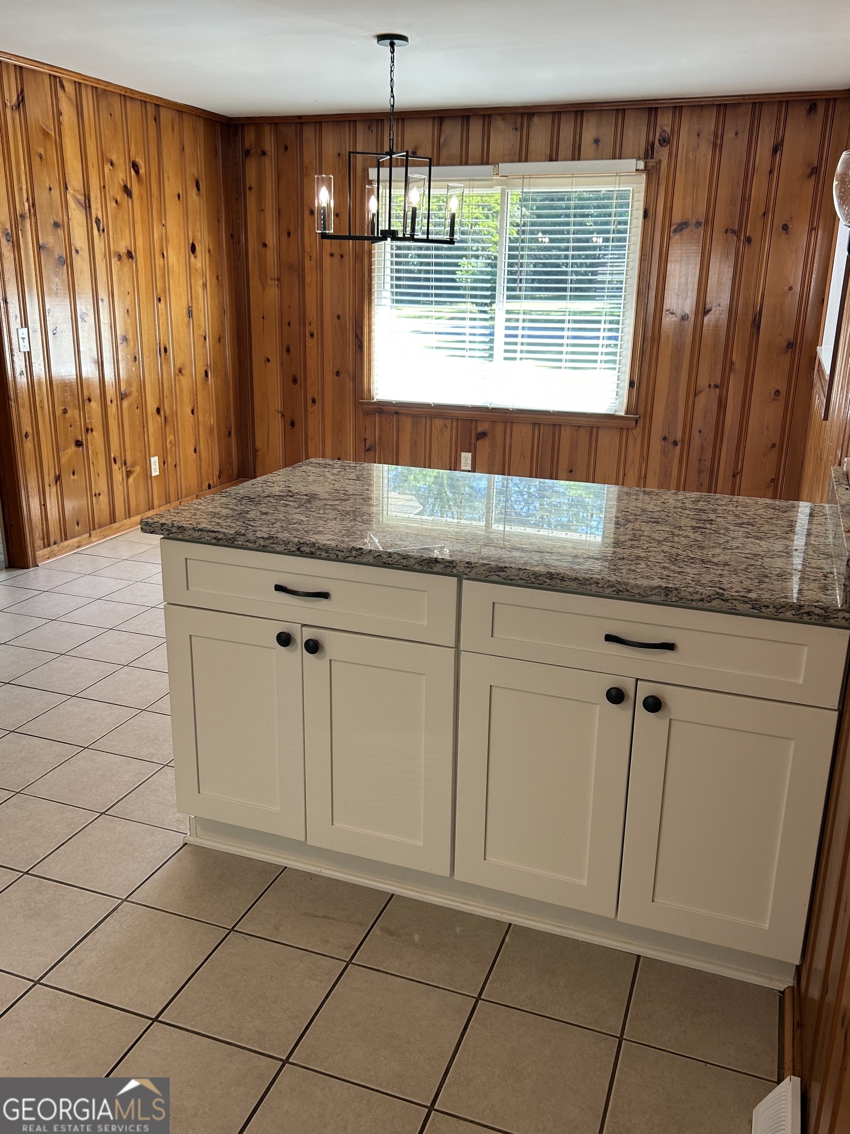 2 Ford Road Southeast Rome, GA 30161 - Photo 7 of 19 a kitchen with granite countertop a sink window and cabinets