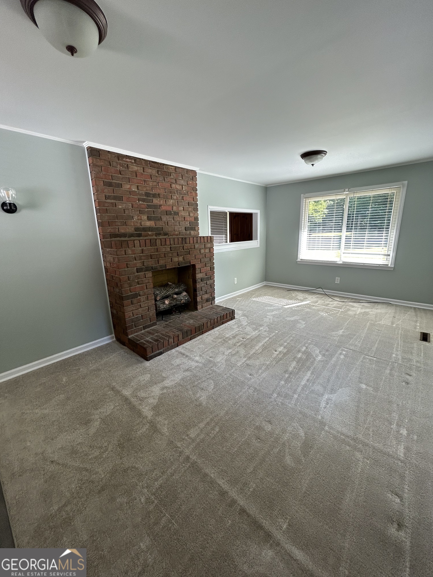 2 Ford Road Southeast Rome, GA 30161 - Photo 9 of 19 an empty room with windows