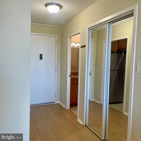 wooden floor and closet in a room