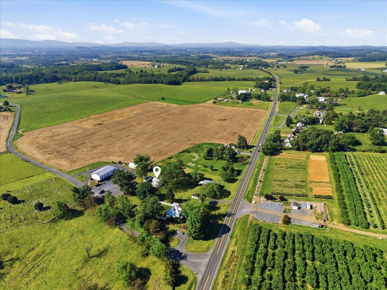 5096 Battlefield Road Harrisonburg, VA 22801 - Photo 29 of 38 an aerial view of a golf course with a lake view
