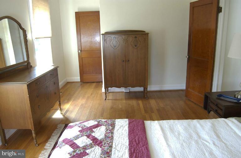645 Coleraine Road Baltimore, MD 21229 - Photo 2 of 28 a view of a living room with wooden floor
