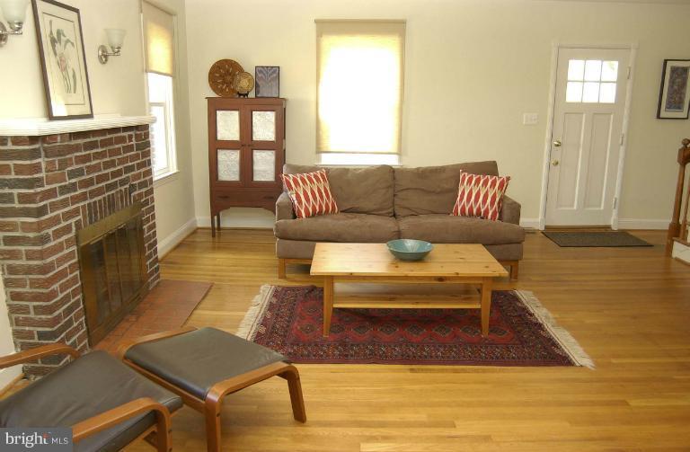 645 Coleraine Road Baltimore, MD 21229 - Photo 24 of 28 a living room with furniture and a fireplace
