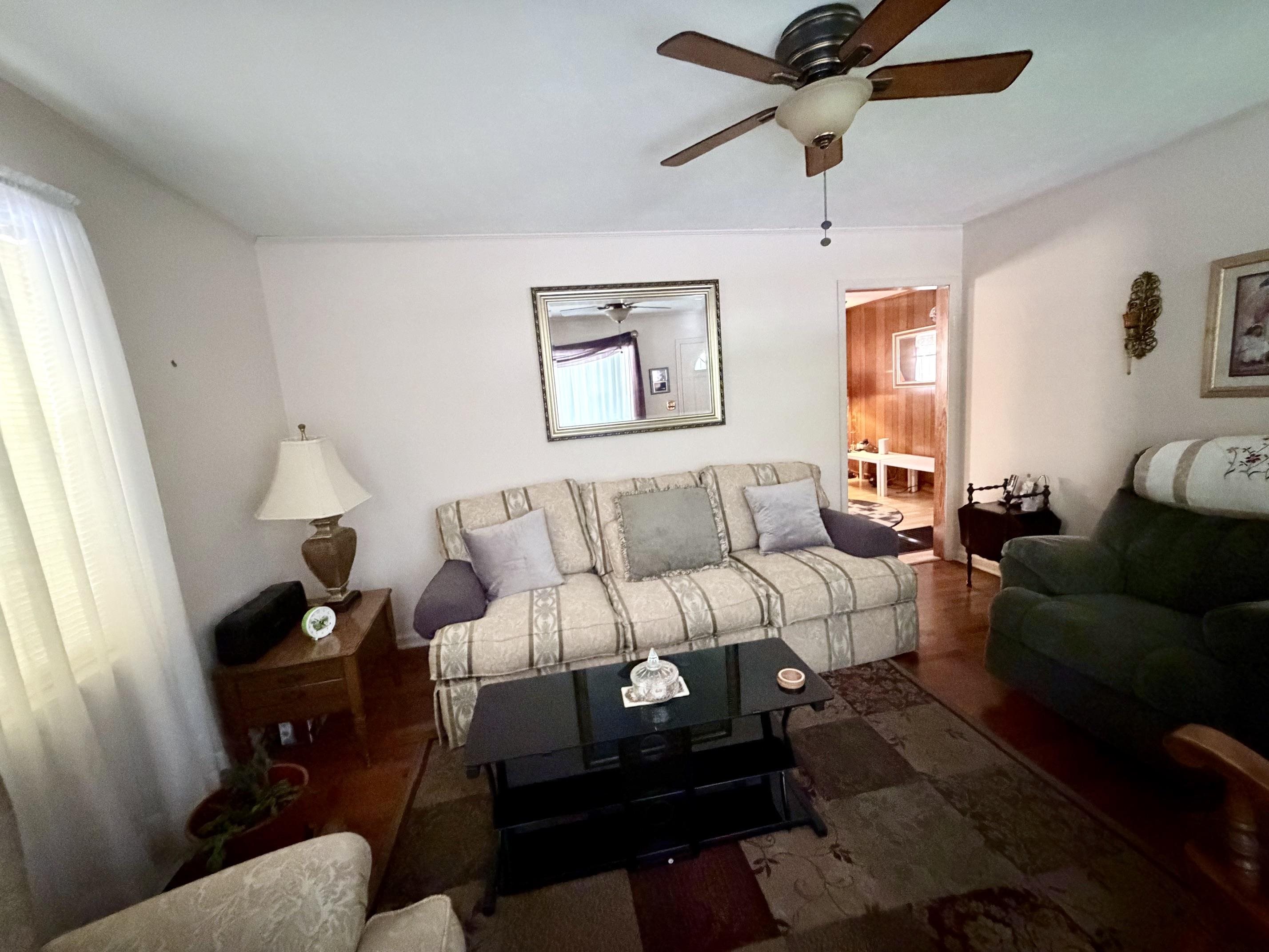 321 Pipkin Road Jackson, TN 38305 - Photo 2 of 16 a living room with furniture and a window