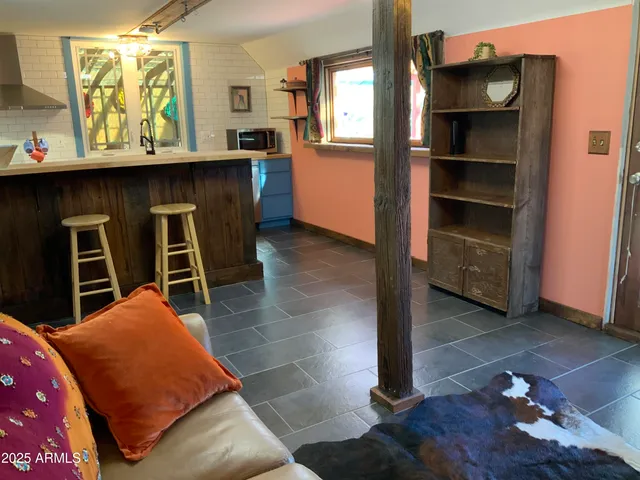 a kitchen with stainless steel appliances a sink and cabinets