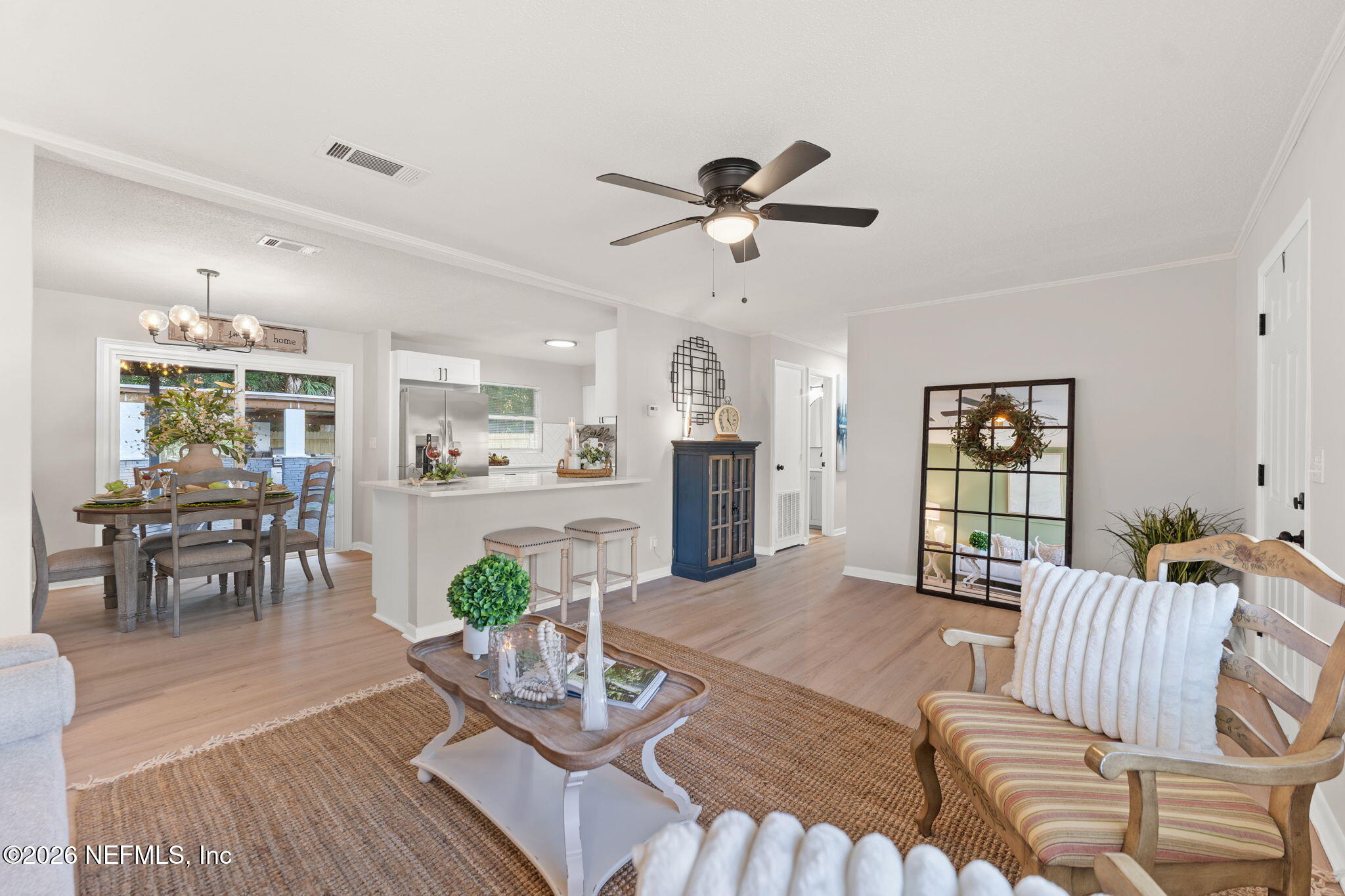 2455 Seaway Street Jacksonville, FL 32233 - Photo 3 of 16 a living room with furniture fireplace and dining table