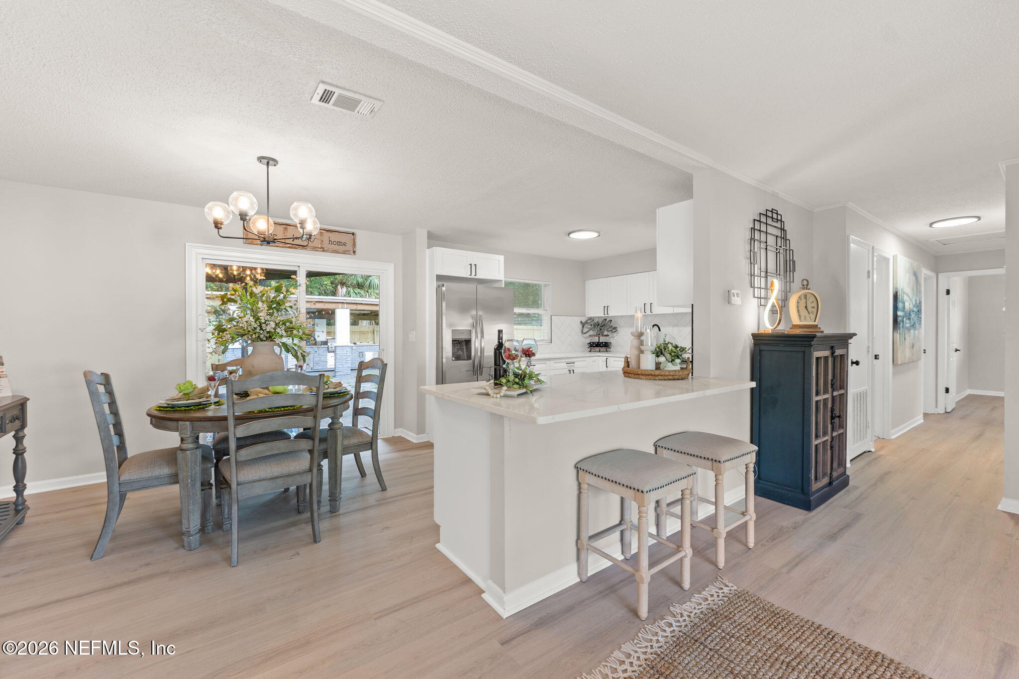 2455 Seaway Street Jacksonville, FL 32233 - Photo 4 of 16 a dining room with furniture and window