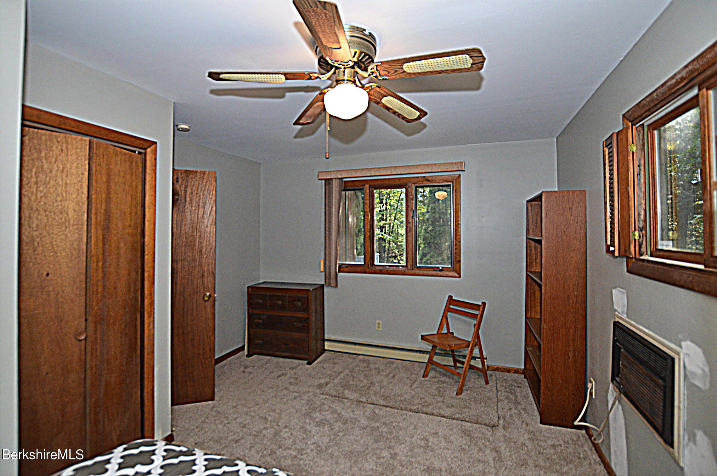 2477 West Center Road Otis, MA 01253 - Photo 14 of 31 a living room with furniture and a window