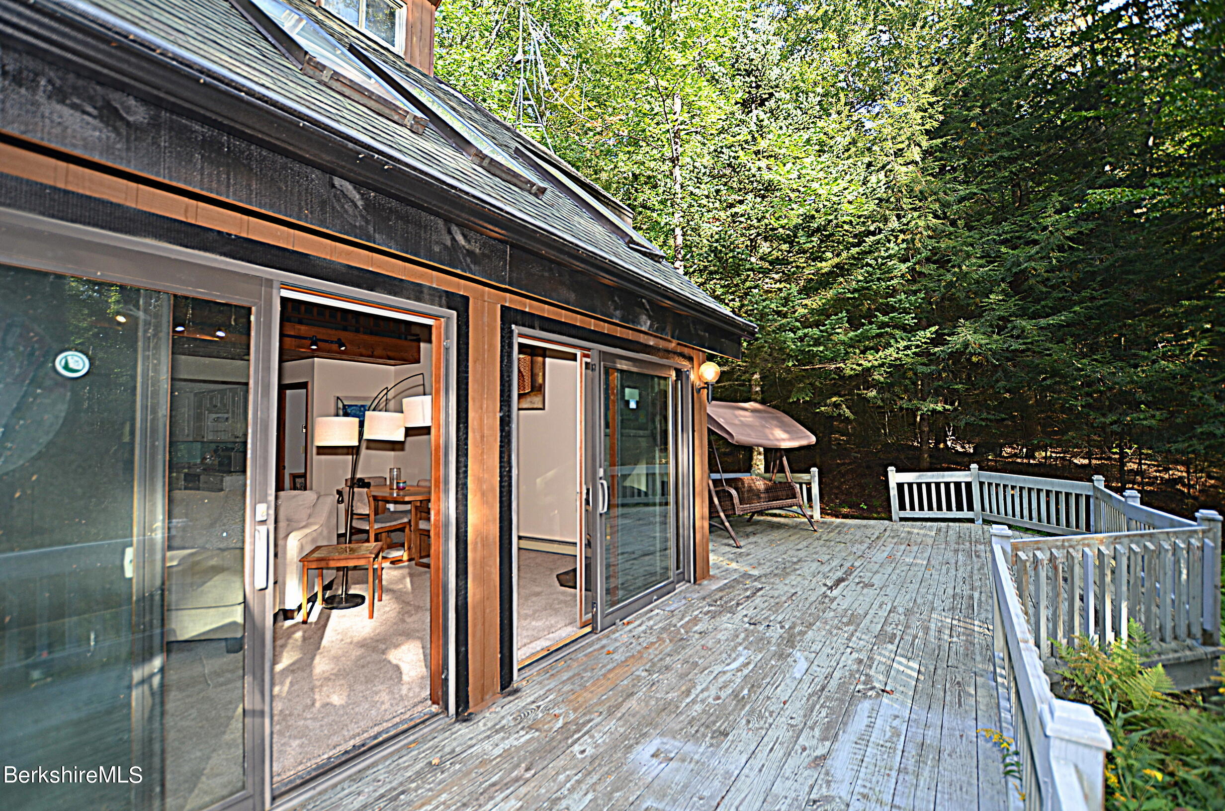 2477 West Center Road Otis, MA 01253 - Photo 31 of 31 a view of a house with backyard and deck