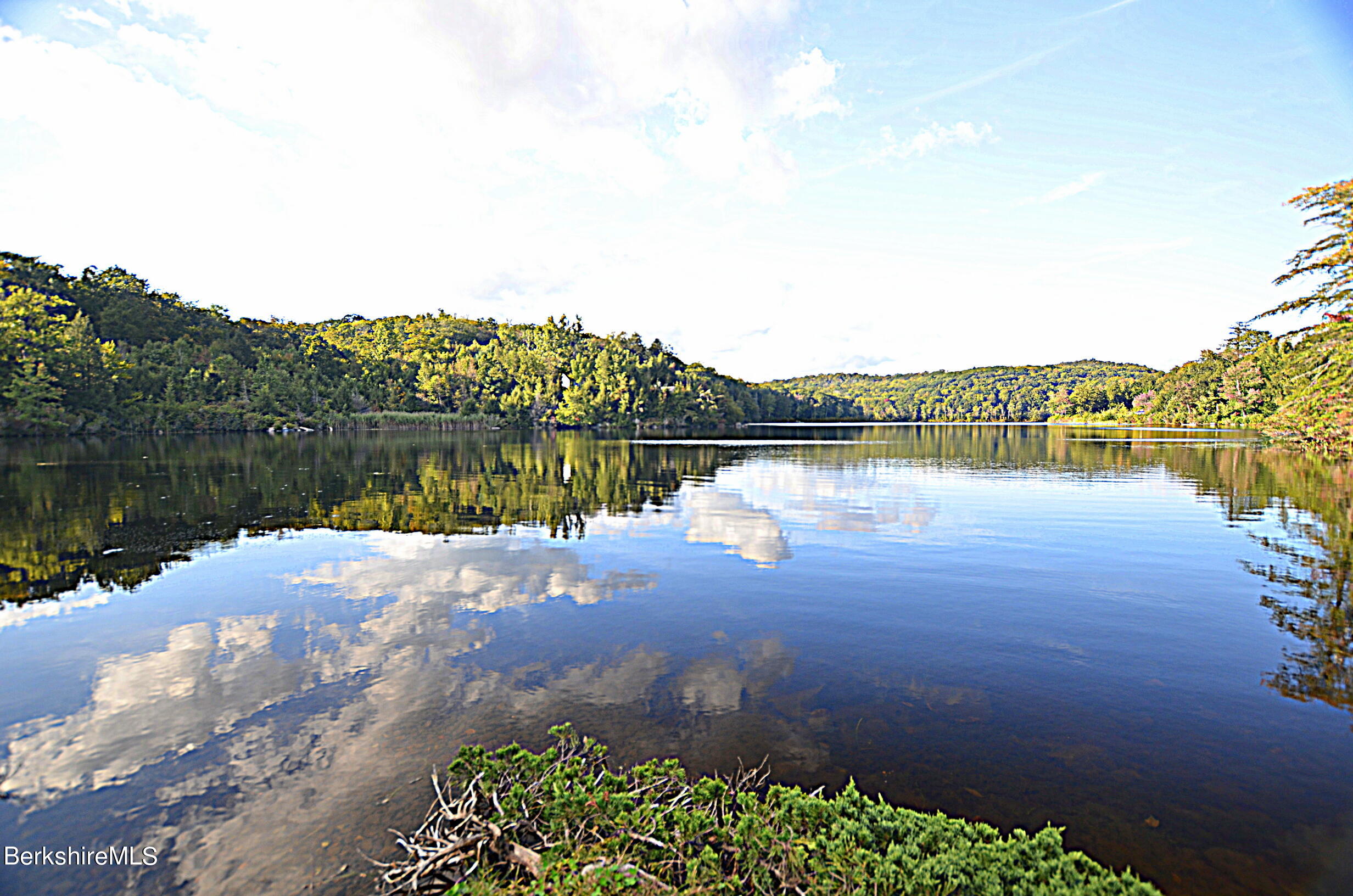 2477 West Center Road Otis, MA 01253 - Photo 4 of 31 a view of a lake with houses in ocean