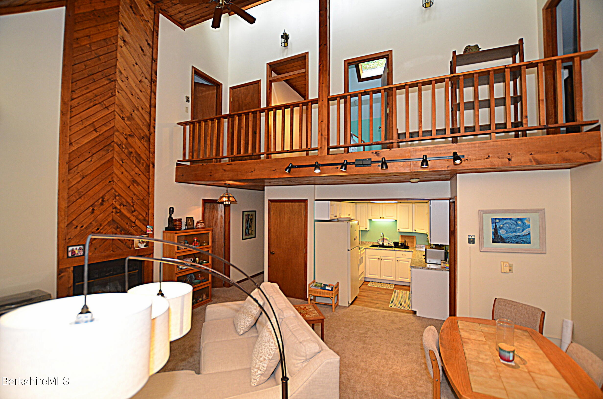 2477 West Center Road Otis, MA 01253 - Photo 10 of 31 a view of a livingroom with furniture and staircase
