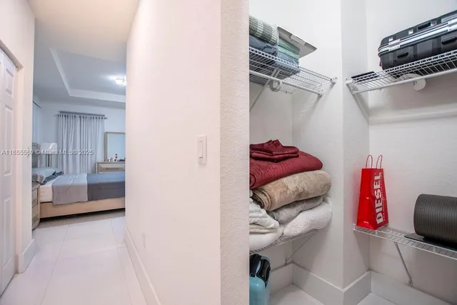 a bathroom with a shower and a sink