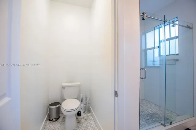 a aerial view of a house with garden and plants