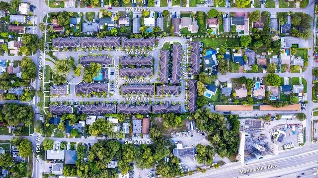 a view of room that has a white walls