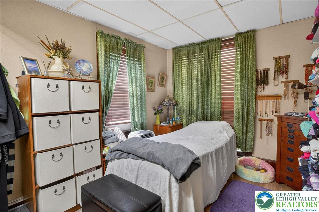 357 Main Road Lehighton, PA 18235 - Photo 14 of 38 a bedroom with a bed a dresser and next to a window
