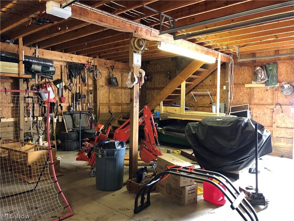 2776 Work Road Ravenna, OH 44266 - Photo 33 of 35 Large additional two car garage with walk up loft storage area.