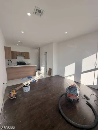 a kitchen with a sink and a stove