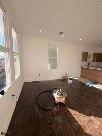 a living room with dining table