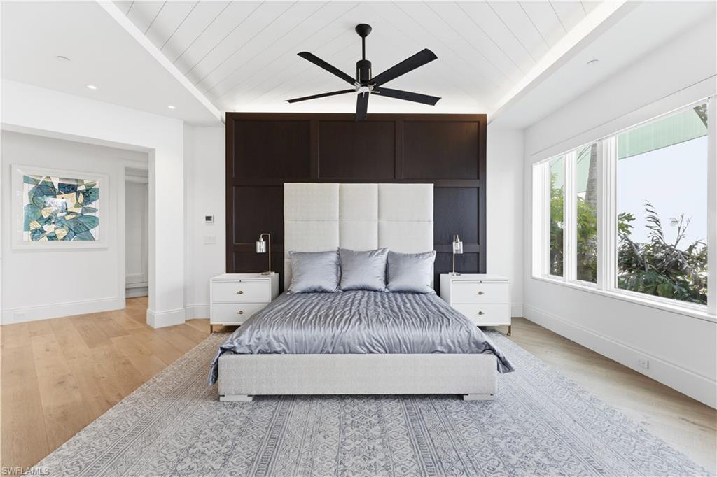 909 10th Street South, Unit 201 Naples, FL 34102 - Photo 9 of 42 Bedroom with wooden ceiling, light wood finished floors, ceiling fan, and recessed lighting
