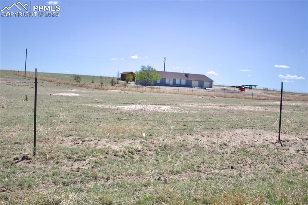 425 Weissenfluh Road Yoder, CO 80864 - Photo 7 of 38 a view of a road from a yard
