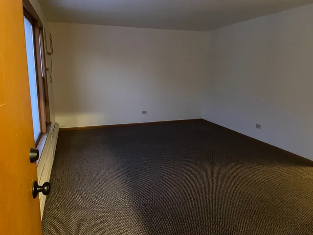 an empty room with a door