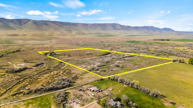 a view of an ocean and a mountain