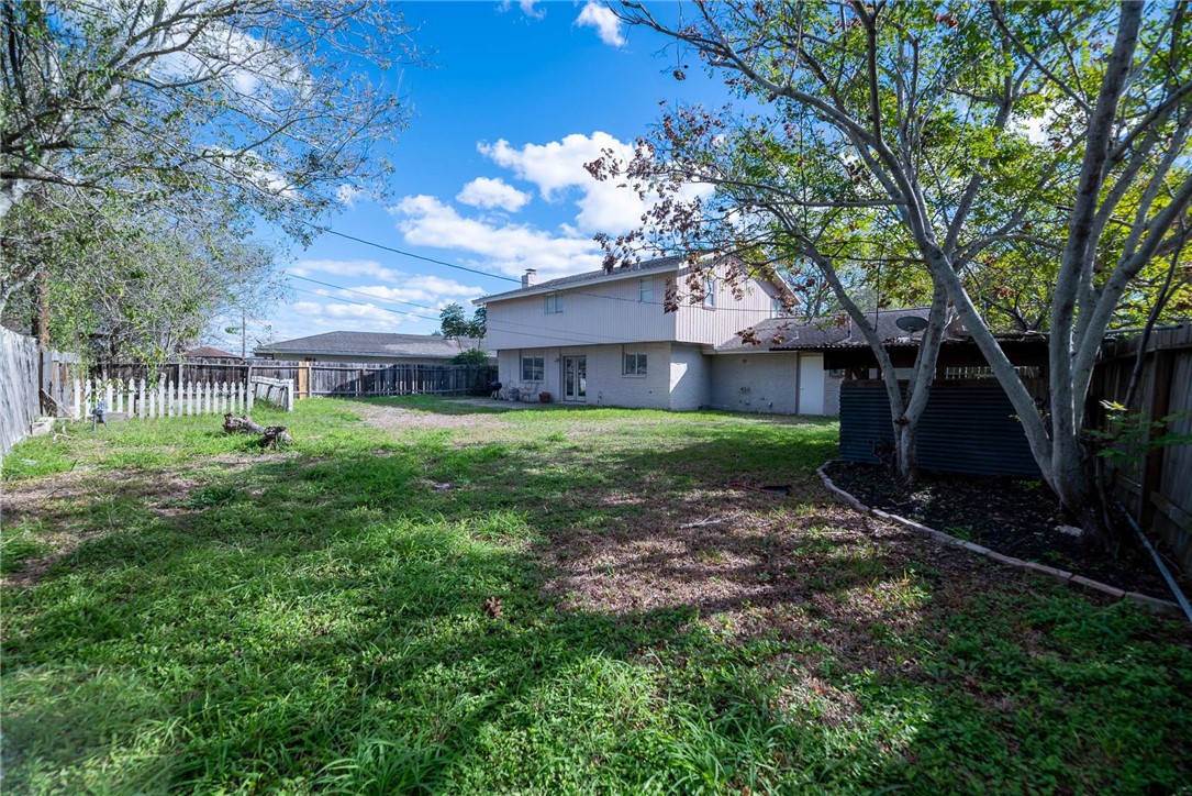 4622 Coventry Lane Corpus Christi, TX 78411 - Photo 30 of 31 a view of a house with a yard