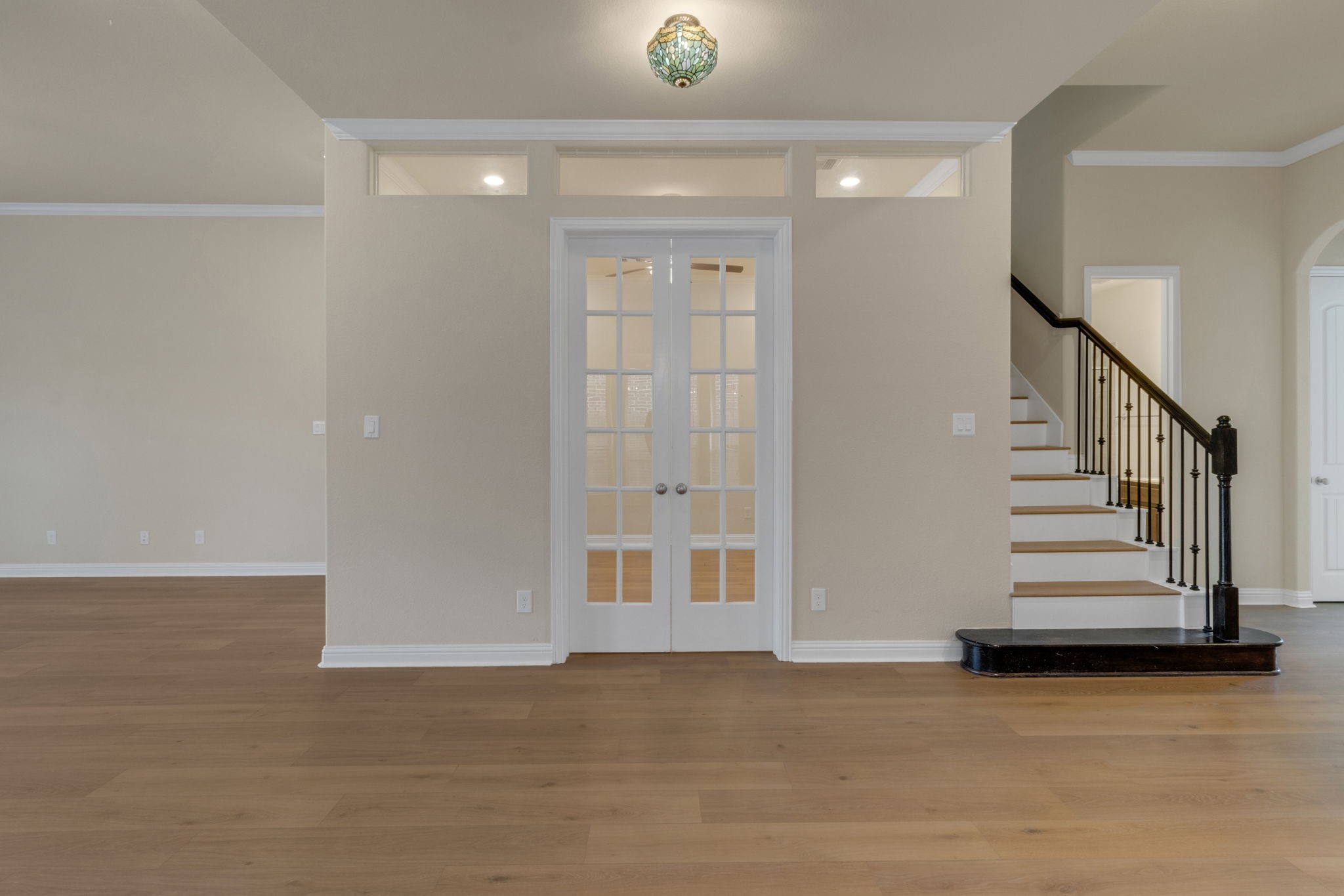 23509 Red Juniper Lane New Caney, TX 77357 - Photo 18 of 48 Beautiful Tiffany Light and French Doors welcome you into the office space