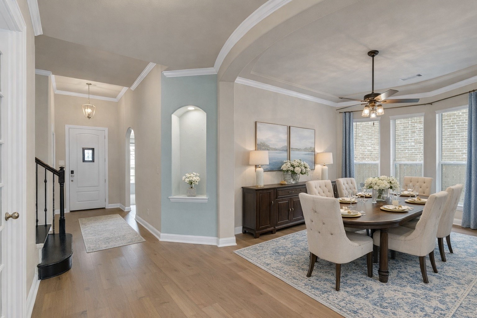 23509 Red Juniper Lane New Caney, TX 77357 - Photo 3 of 48 a view of a dining room with furniture window and wooden floor