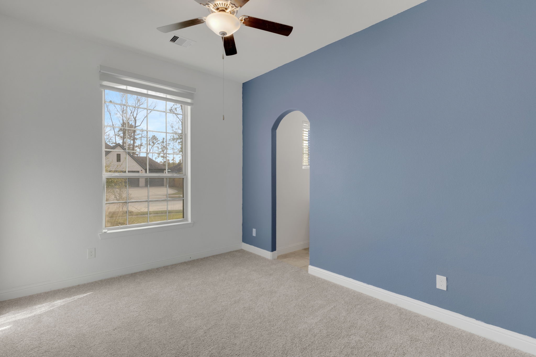 23509 Red Juniper Lane New Caney, TX 77357 - Photo 38 of 48 an empty room with a empty space and windows
