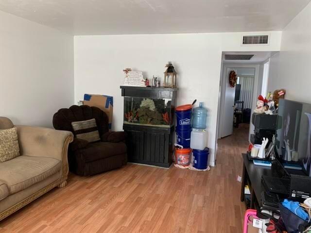 308 Brighton Drive, Unit H Boca Raton, FL 33434 - Photo 7 of 9 LIVING ROOM