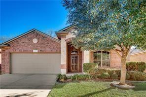 3105 Pecan Tree Drive Denton, TX 76210 - Photo 1 of 25 View of front of property with an attached garage, driveway, a front lawn, and brick siding