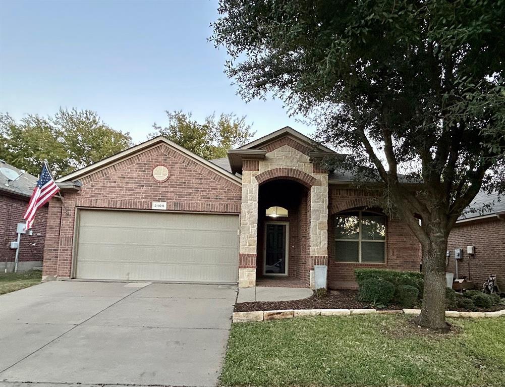 3105 Pecan Tree Drive Denton, TX 76210 - Photo 2 of 25 French country style house featuring stone siding, brick siding, and concrete driveway