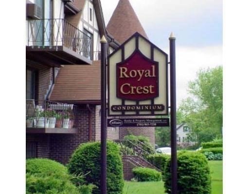 a sign on a pole on a street