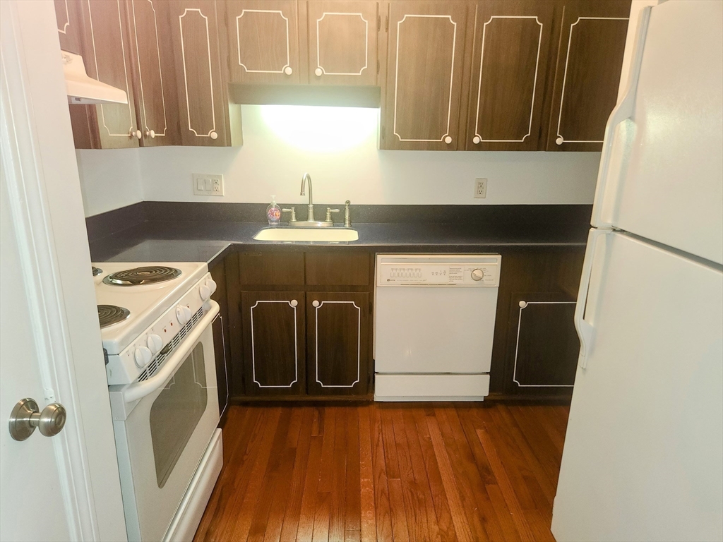 1003 North Main Street, Unit 7 Randolph, MA 02368 - Photo 12 of 31 a utility room with dryer and washer