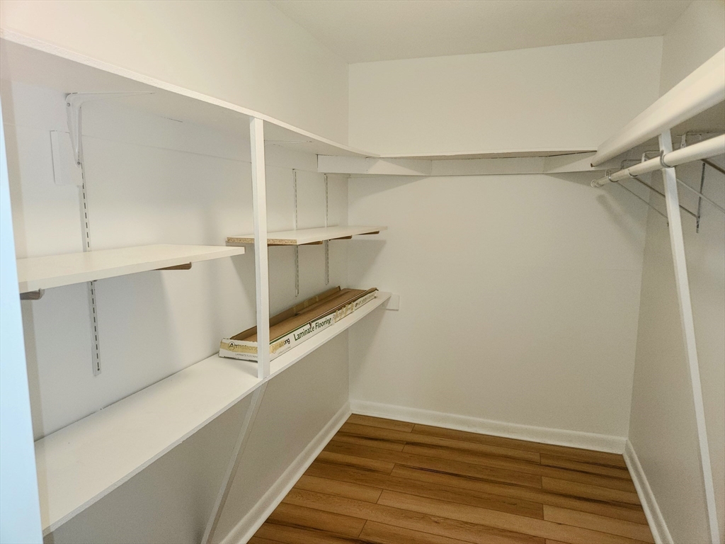 1003 North Main Street, Unit 7 Randolph, MA 02368 - Photo 20 of 31 a view of an empty walk in closet