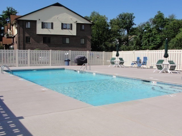 1003 North Main Street, Unit 7 Randolph, MA 02368 - Photo 26 of 31 a view of a house with a yard and sitting area