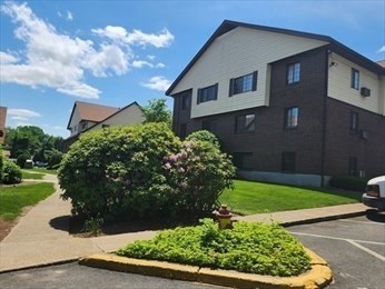 1003 North Main Street, Unit 7 Randolph, MA 02368 - Photo 30 of 31 a house view with a garden space
